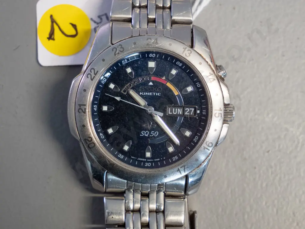 Seiko Kinetic gent's wristwatch with booklet and 1998 purchase card - some wear to markings on bezel Image 1++