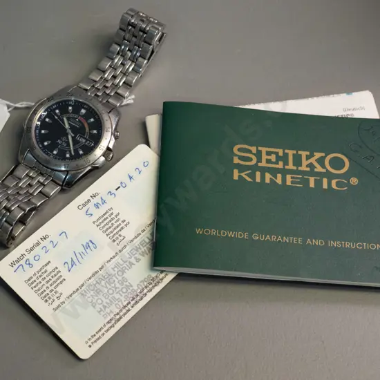 Seiko Kinetic gent's wristwatch with booklet and 1998 purchase card - some wear to markings on bezel