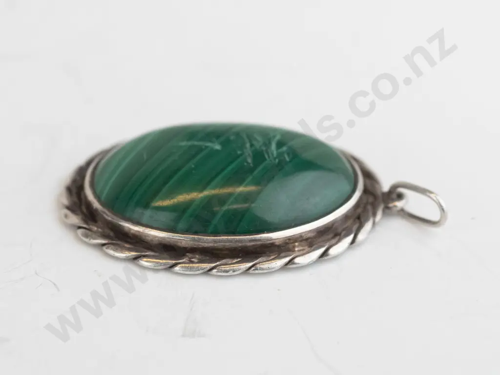 silver & green mottled stone pendant stamped stg sil, no chain, scratches to stone Image 1++