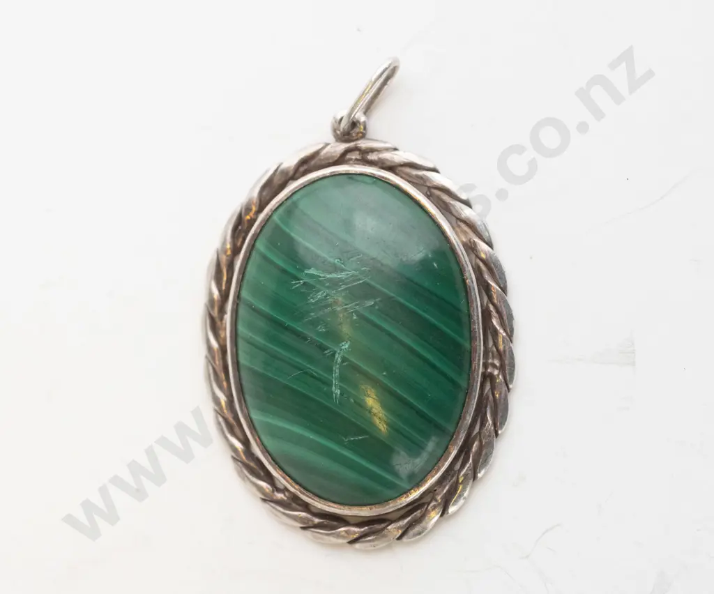 silver & green mottled stone pendant stamped stg sil, no chain, scratches to stone Image 1++