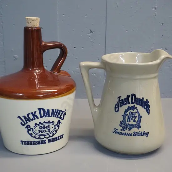 2 large stoneware Jack Daniels Old No. 7 whiskey jugs, both marked USA, one with cork stopper H250 other marked 3051