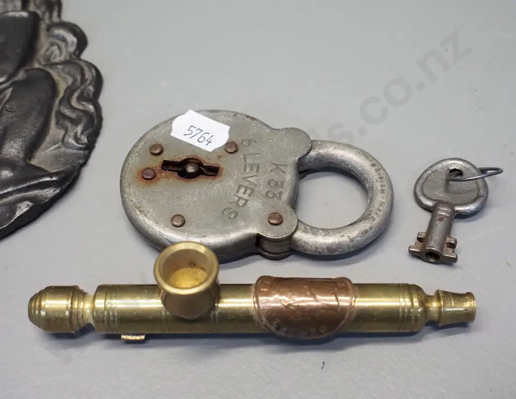 small brass crocodile nutcracker, vintage padlock, brass smoker's pipe with George VI coin and a flat cast metal dwarf Image 1++