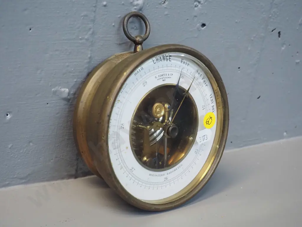 brass cased holosteric barometer, with wall hanging loop, marked "G. Coates and Co Christchurch" Diameter 130 Image 1++