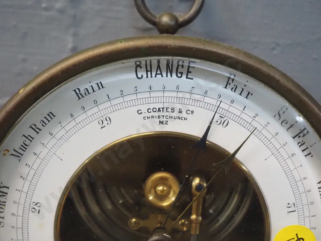 brass cased holosteric barometer, with wall hanging loop, marked "G. Coates and Co Christchurch" Diameter 130 Image 1++