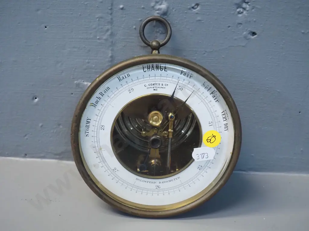 brass cased holosteric barometer, with wall hanging loop, marked "G. Coates and Co Christchurch" Diameter 130 Image 1++