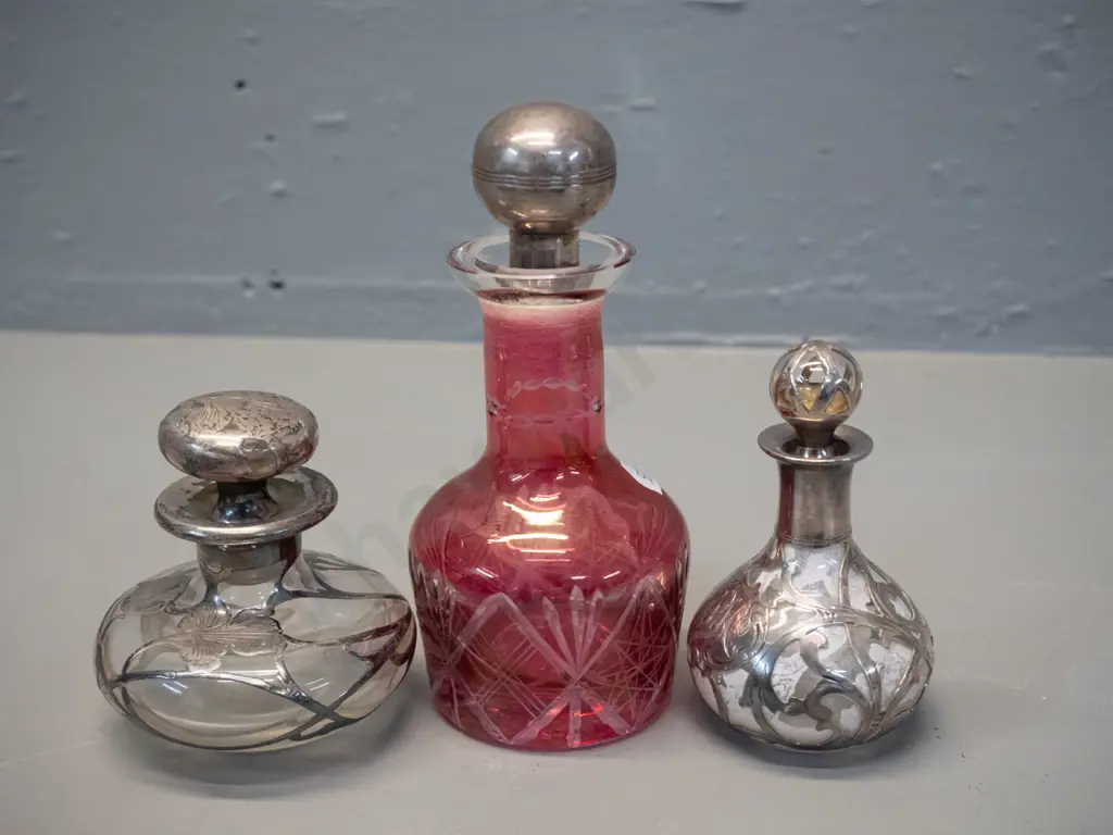 3 vintage scent bottles - 2 clear glass with monogrammed silver filigree overlay, smaller one marked 999/1000, taller is Image 1++