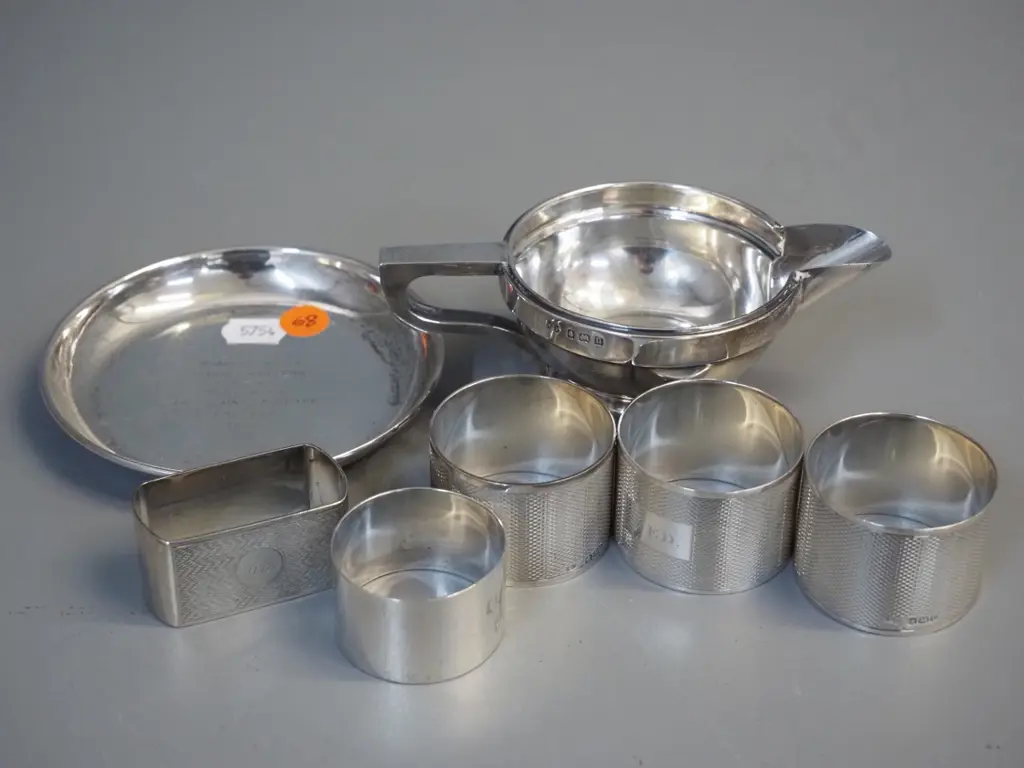sterling silver items - 5 napkin rings, small cream jug and a small sweet dish with Gov. Gen. Bledisloe inscription Image 1++