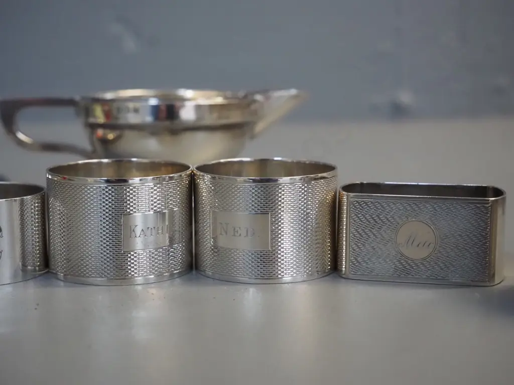 sterling silver items - 5 napkin rings, small cream jug and a small sweet dish with Gov. Gen. Bledisloe inscription Image 1++