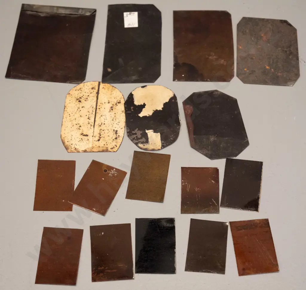 17 assorted small antique American tintype portrait photographs including 10 "gem" size portraits. Largest is H75 W60, Image 1++