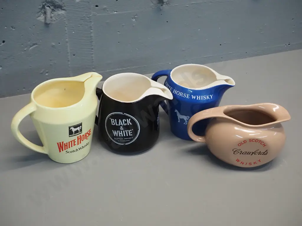 4 Scotch whisky water jugs all made by Wade. Tallest is H135 Image 1++