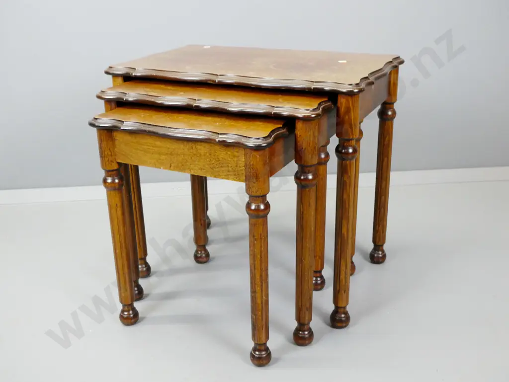 3 mid-century mahogany nesting tables with shaped front edge, fluted turned legs - rings and marks to tops of all 3 Image 1++