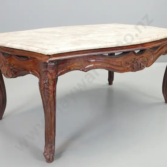 reproduction serpentine fronted coffee table on carved cab legs with multi-coloured hard stone top, some scratching H490