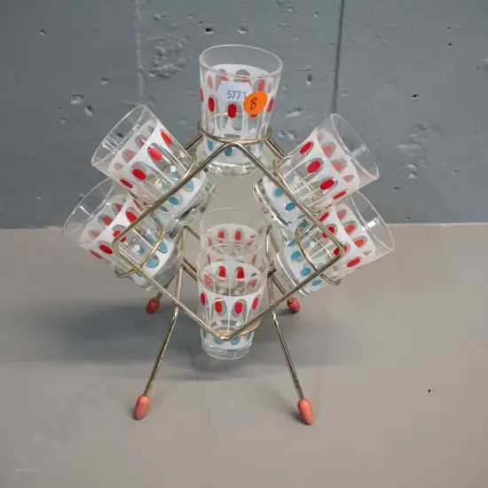 mid-century set of 6 shot-glasses in metal stand with mirrored back H-200 W-200 Slightly bent frame, one leg raised