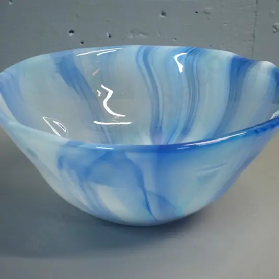 heavy art glass bowl in shades of blue H-140 D-310