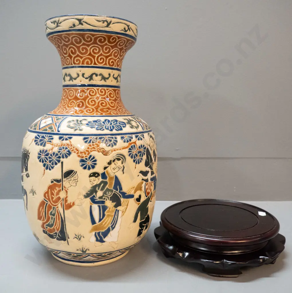 Vietnamese relief pattern vase on carved wooden stand - vase marked Saigon on base. Hairline crack, glaze fleck on rim. Image 1++