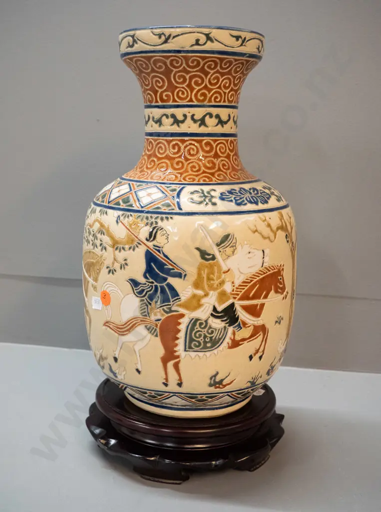 Vietnamese relief pattern vase on carved wooden stand - vase marked Saigon on base. Hairline crack, glaze fleck on rim. Image 1++