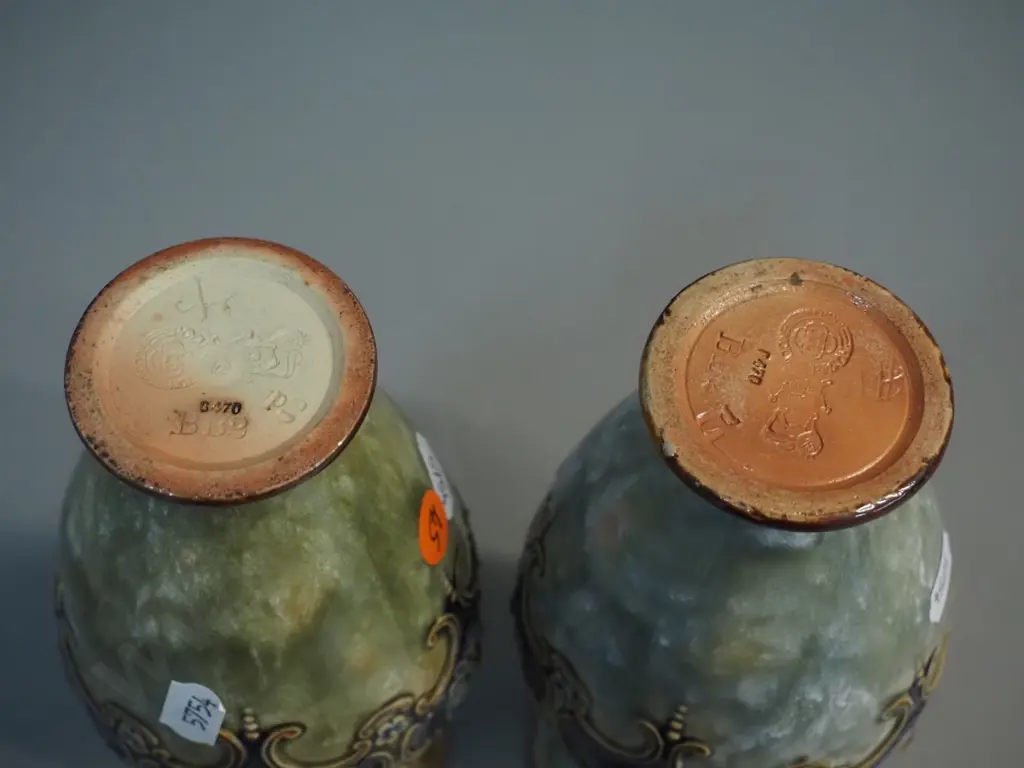 pair Royal Doulton raised design vases (slightly different colouring) H-190 - one vase has major repairs Image 1++