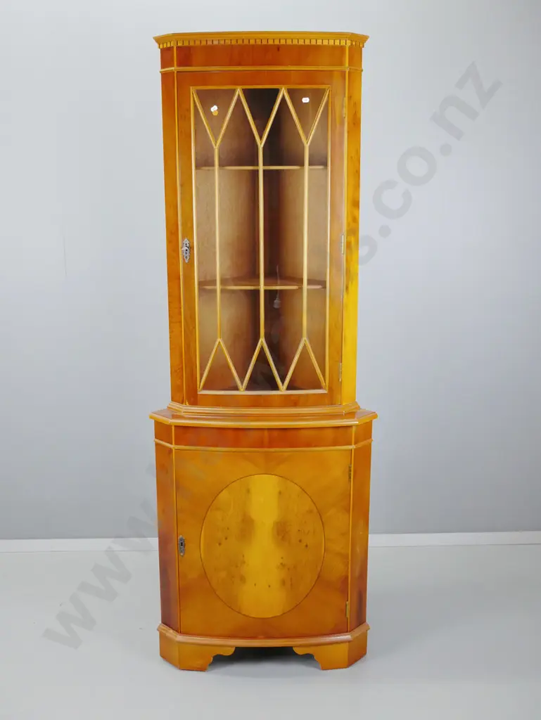 reproduction yew corner cupboard with astragal glazed top door, solid lower cupboard, 2 shelves in top, 1 in bottom Image 1++