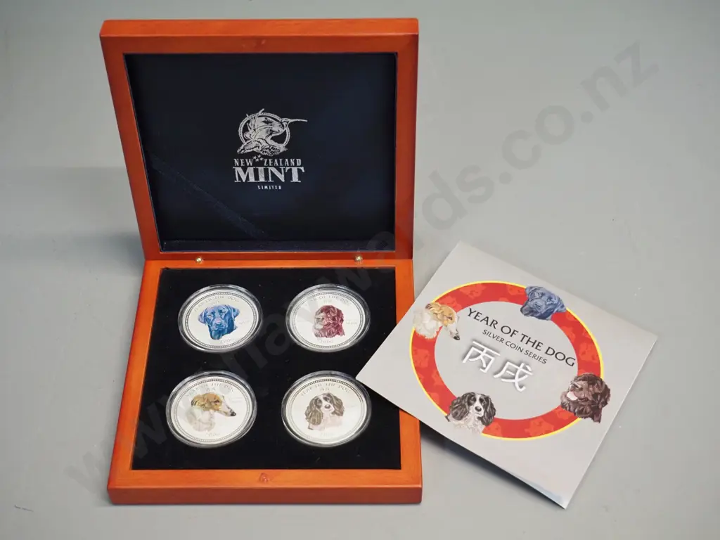 New Zealand coins - 2006 Year of the Dog cased set of 4 - .999 silver Image 1++