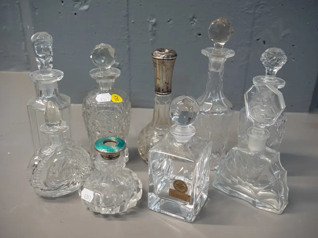 9 glass & lead crystal scent bottles, two with sterling silver collars, one w/ enamel, missing stoppers, a few w/ chips, Image 1++