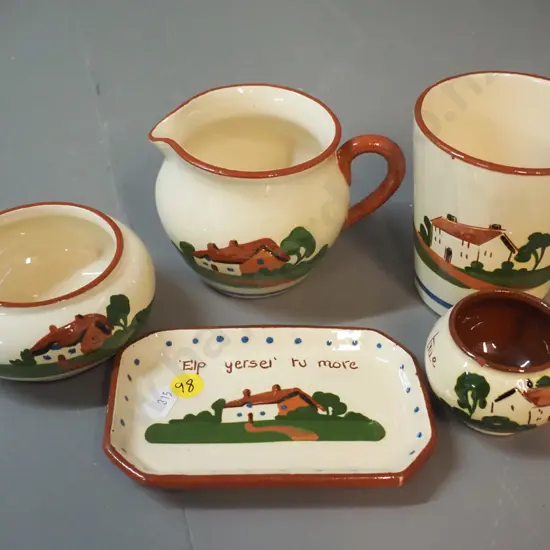 5 pieces of Torquay motto ware - beaker H-100, salt dish, pin dish, cream & sugar