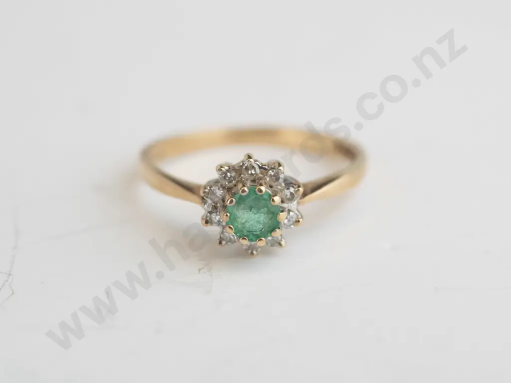 9ct gold emerald and 10x diamond cluster ring, 1.8gms Image 1++
