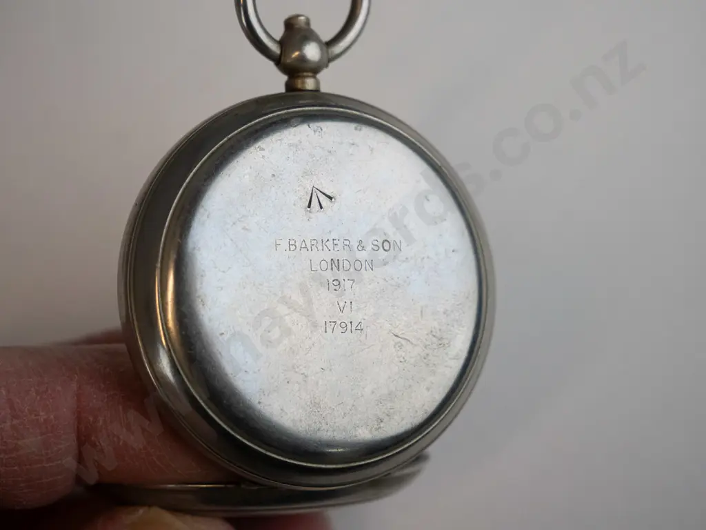 stopwatch marked Swiss Made and a pocket compass marked F. Barker & Co London 1917 Image 1++