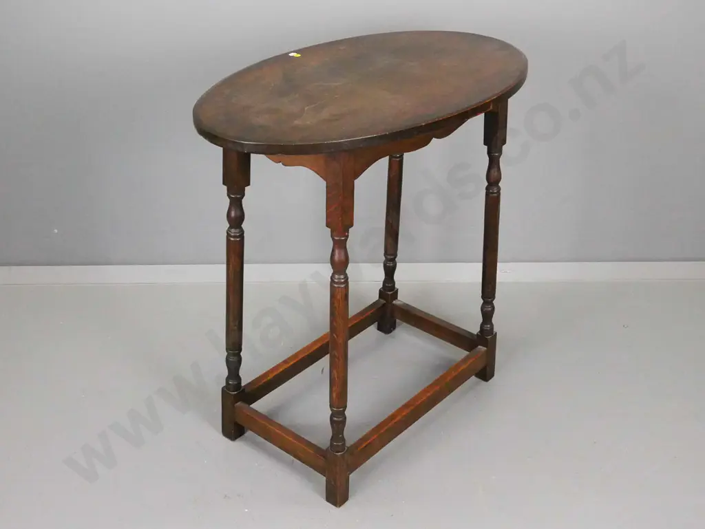 vintage oak oval side table on turned legs with square section box base - some scratching to polish H-760 L-770 D-460 Image 1++