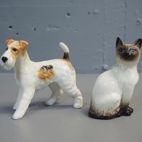 2 Beswick animal figures - Siamese cat and terrier, both approx. H-110