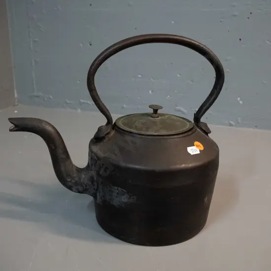 vintage cast-iron kettle marked NWR W.W. along top of handle, w/brass lid slightly dented, some corrosion inside H270