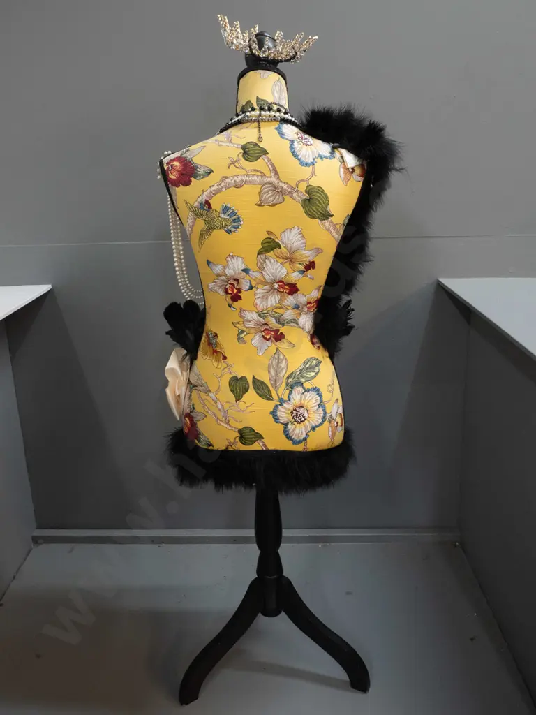 fabric covered timber-based dressmaker's form / mannequin decorated with braid, feathers, and numerous pieces of costume Image 1++