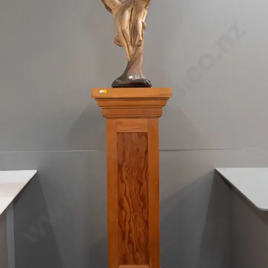 nouveau style porcelain figurine of two women holding round bevelled mirror, on NZ mixed timber pedestal. Some glaze