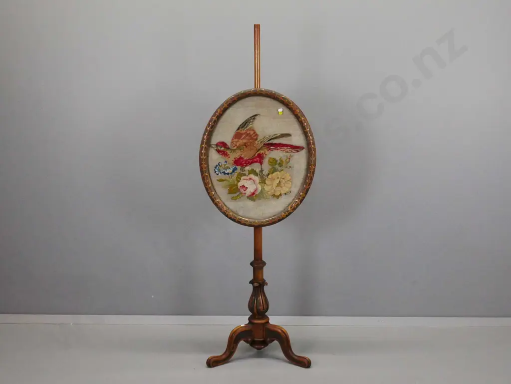 Victorian walnut adjustable pole-screen with oval carved frame, embroidered bird and flower panel, column base with Image 1++
