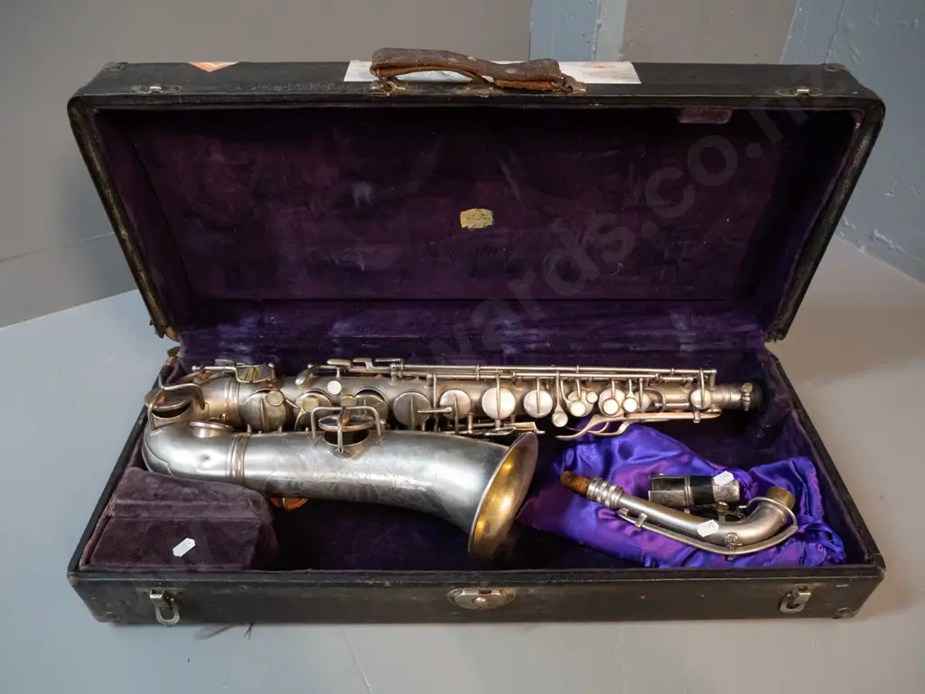 C.G. Conn Elkhart Indiana tenor saxophone with fitted case - some dents and wear to plating, playing condition unknown Image 1++