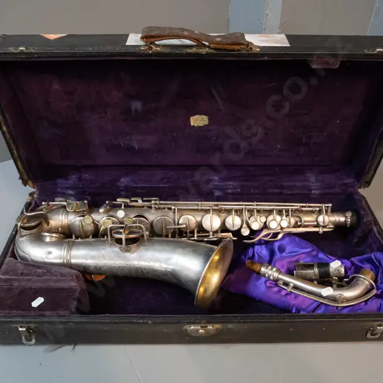 C.G. Conn Elkhart Indiana tenor saxophone with fitted case - some dents and wear to plating, playing condition unknown