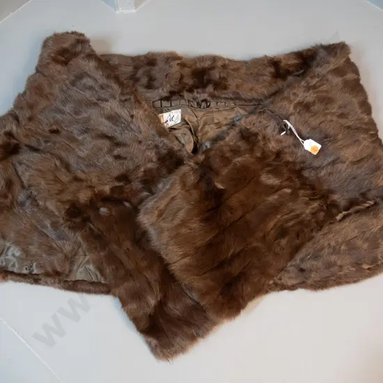 brown fur stole with Lynara label