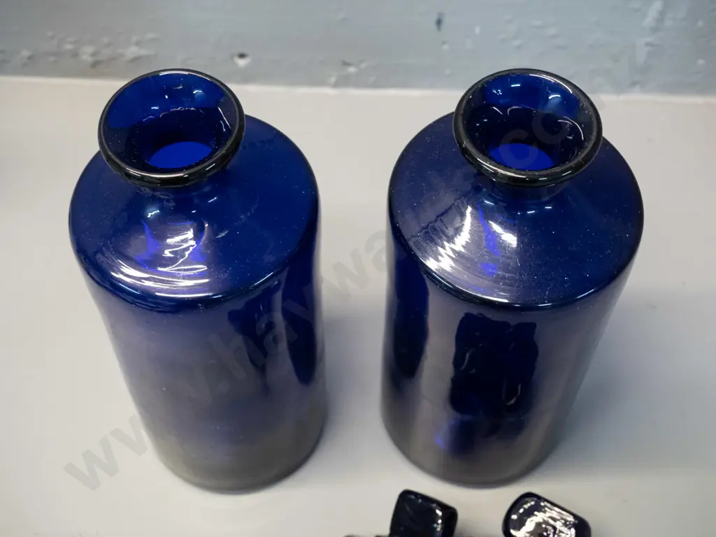 two cobalt blue glass bottles with large stoppers - some chips to inner base of stoppers H240 D90 Image 1++