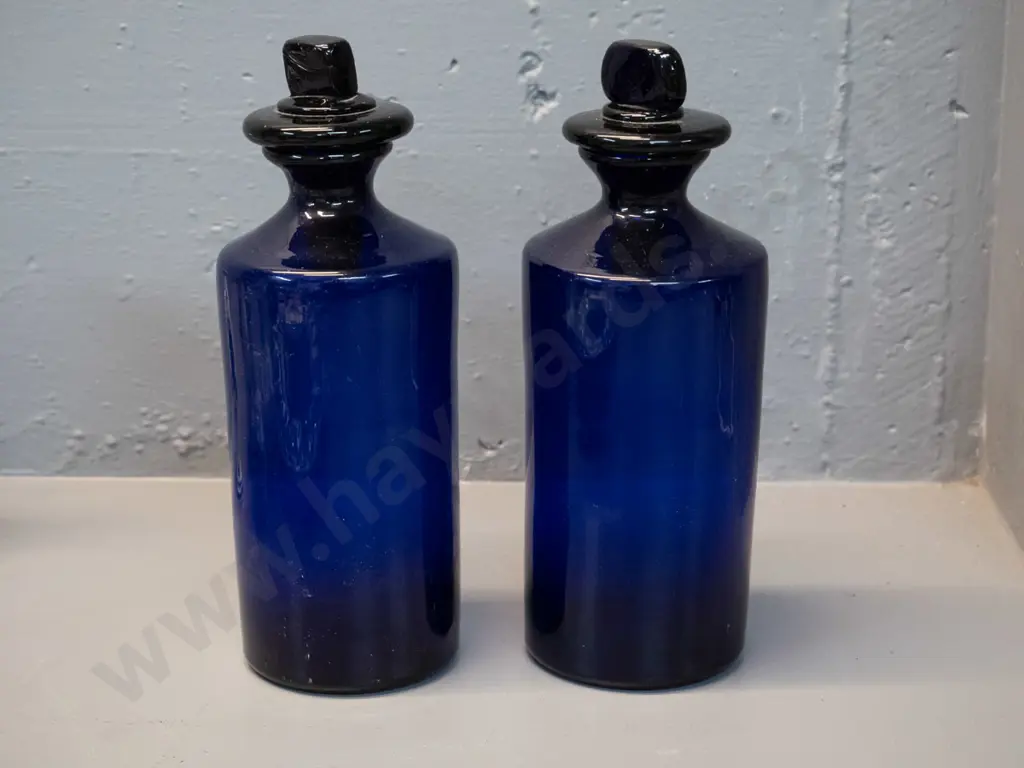two cobalt blue glass bottles with large stoppers - some chips to inner base of stoppers H240 D90 Image 1++