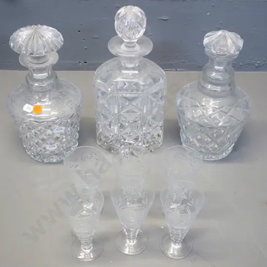 3 cut crystal stoppered decanters, largest is H-270, and a set of 6 sherry glasses