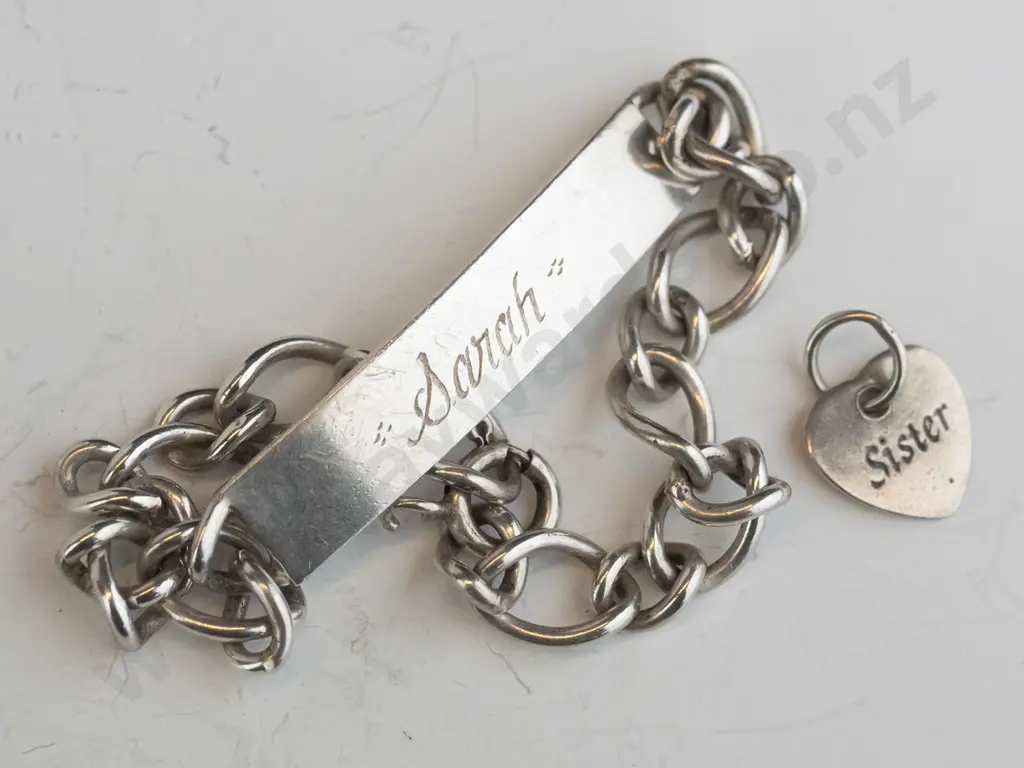 silver ID bracelet "Sarah' stamped stg sil & & silver heart charm 'sister' stamped 925 Image 1++