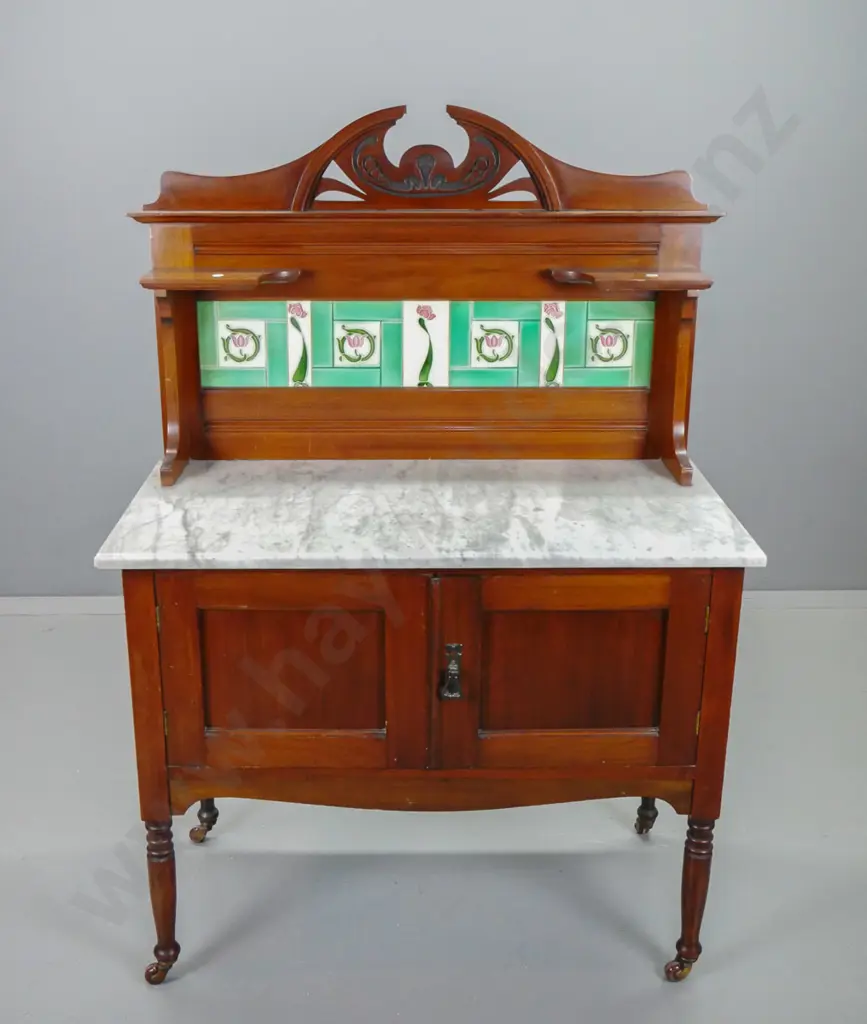 art nouveau style marble topped wash stand with pierced & carved cresting rail, tile back, 2 panelled doors on turned Image 1++