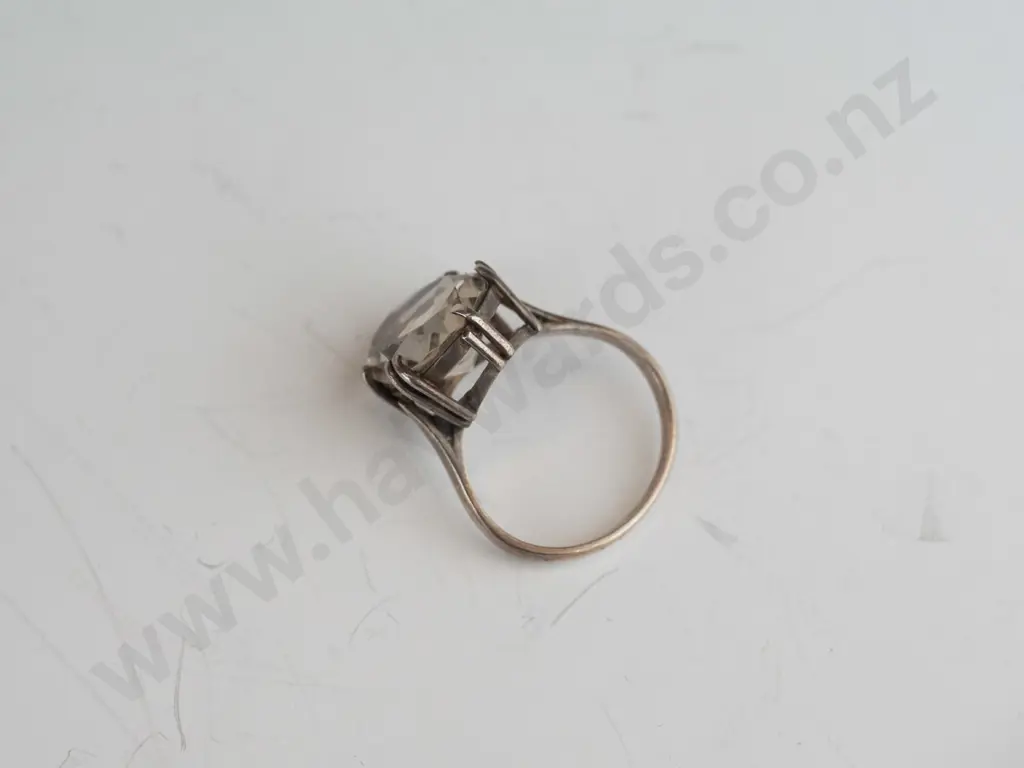 silver dress ring with large clear stone Image 1++