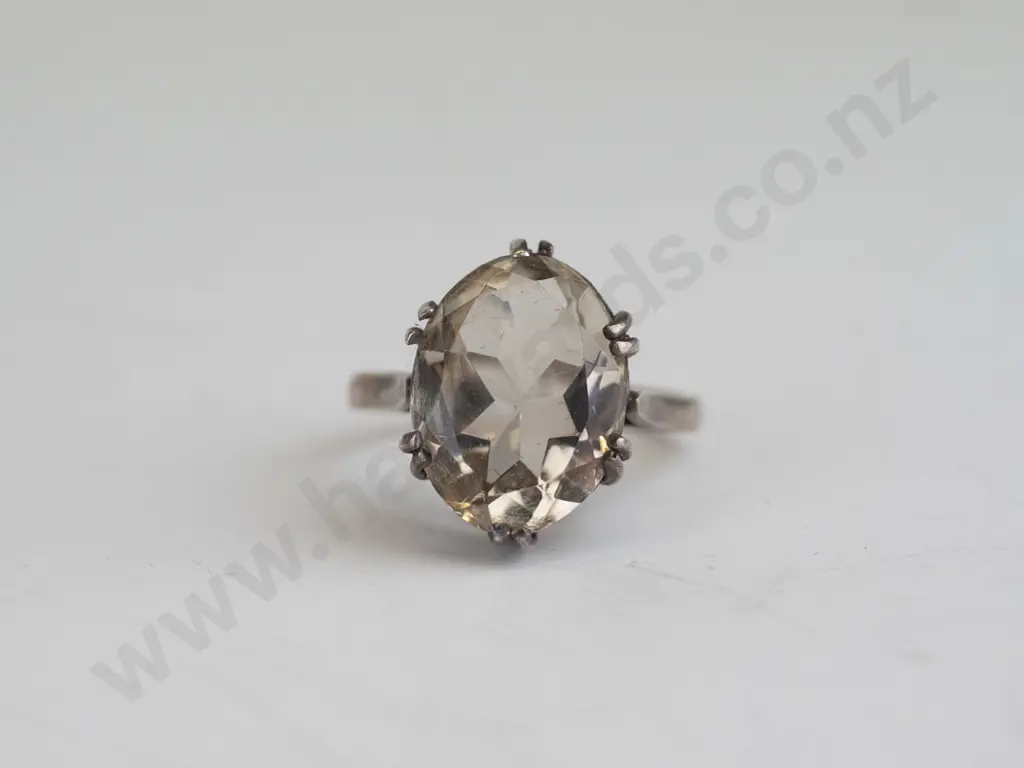 silver dress ring with large clear stone Image 1++