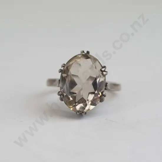 silver dress ring with large clear stone