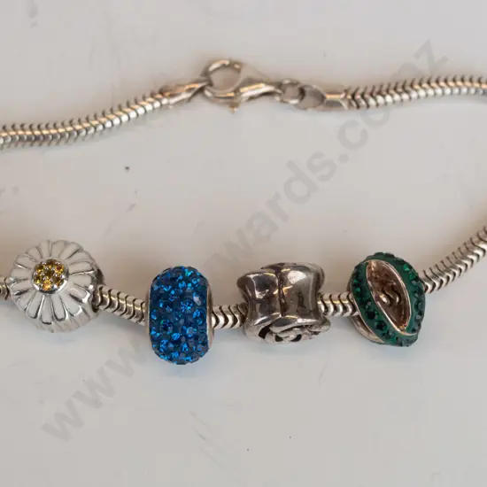 silver bracelet with 4 charms stamped 925