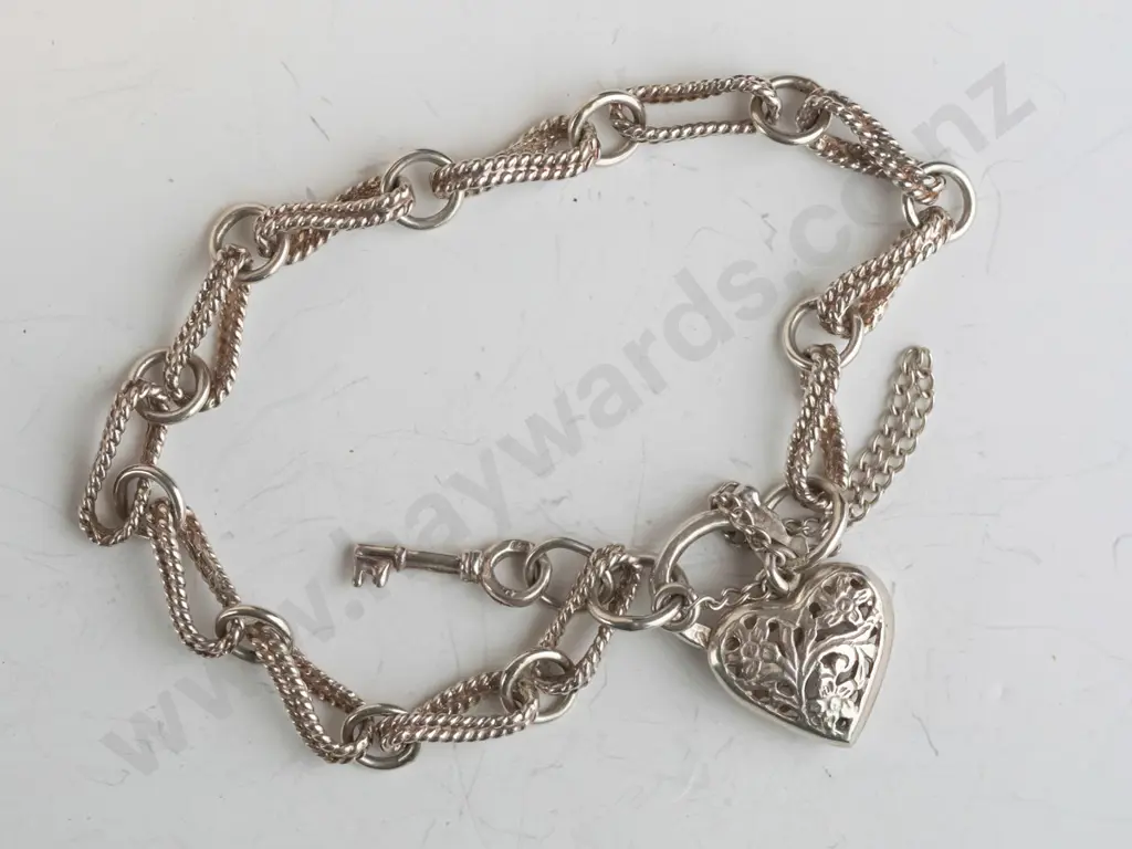 silver bracelet with heart clasp & safety chain stamped 925,clasp needs attention Image 1++