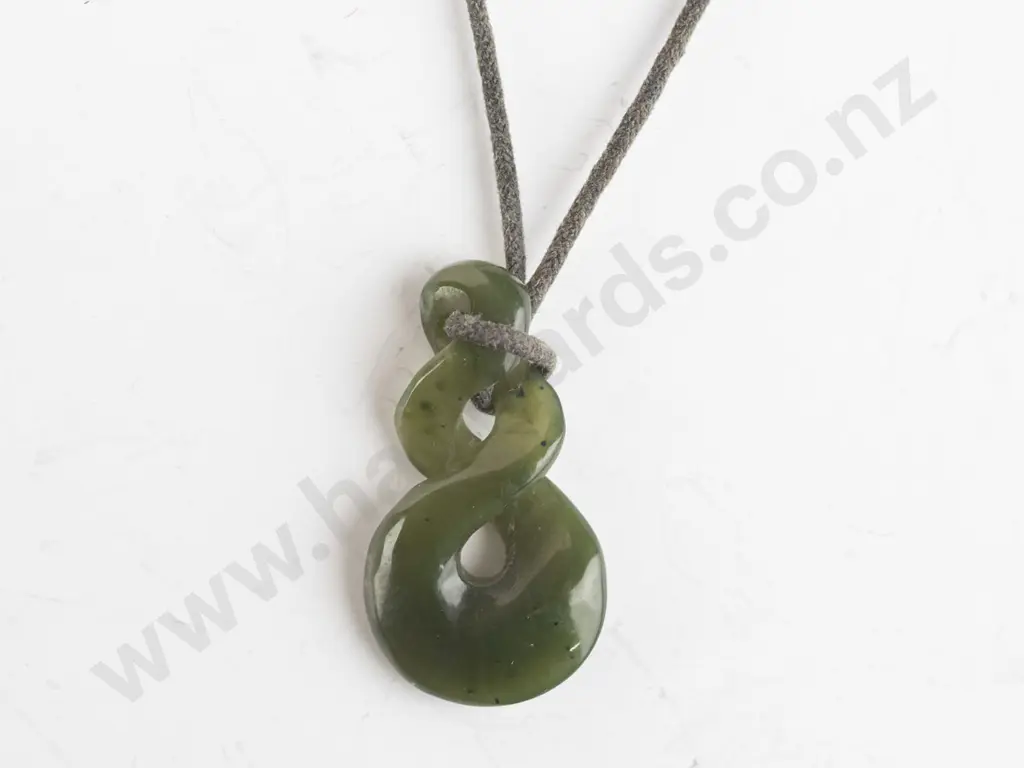 greenstone pendant on leather strand Image 1++