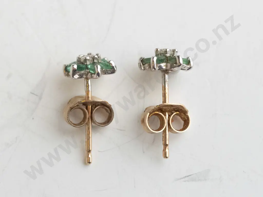 9ct gold pair of emerald and diamond cluster earrings Image 1++