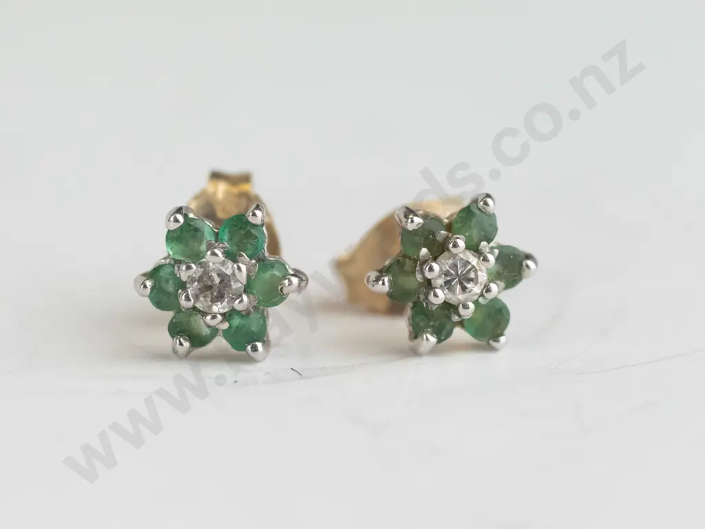 9ct gold pair of emerald and diamond cluster earrings Image 1++