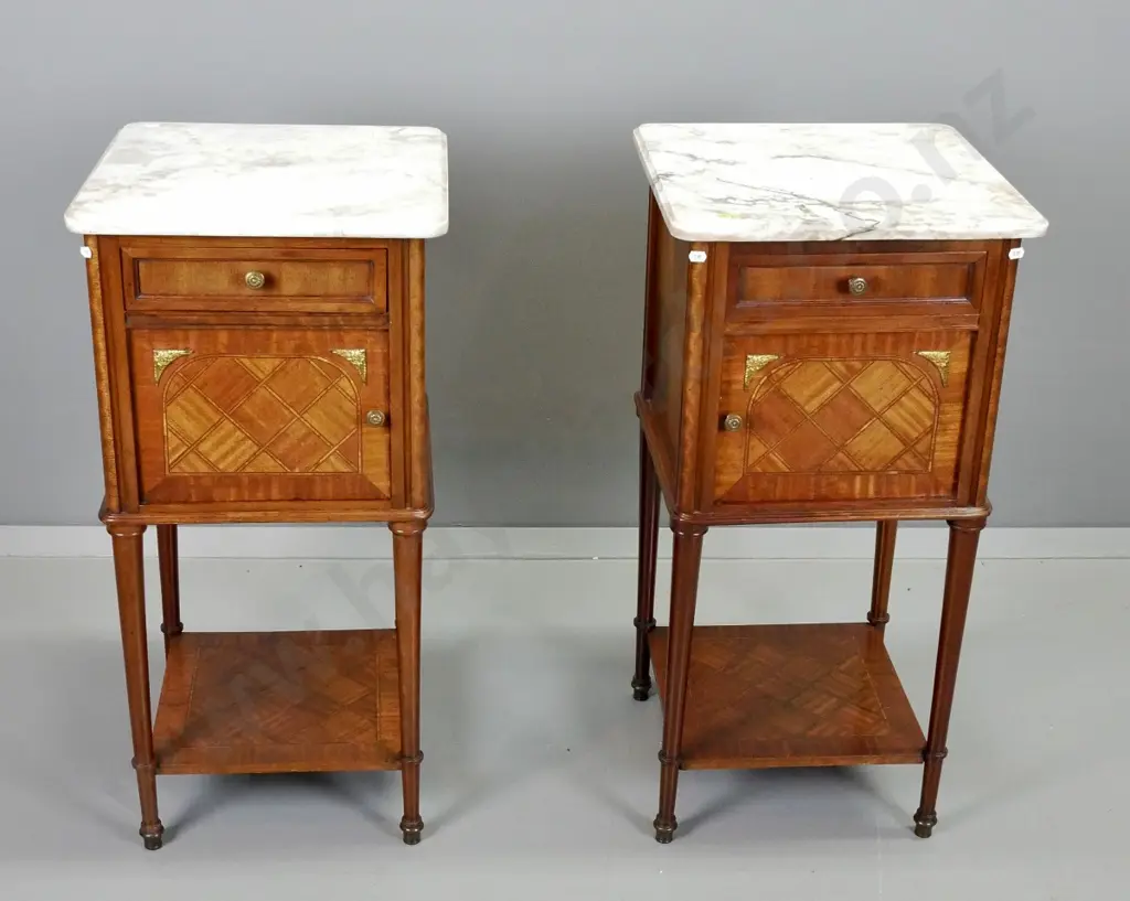 pair of French walnut bedside cabinets with parquetry inlay, marble tops, single drawer and door, brass knobs and corner Image 1++